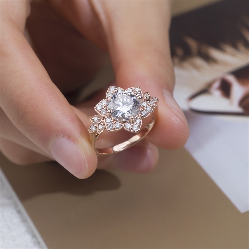 Flower-Shaped Diamond Ring Round Brilliant Center Stone with 4-Prong Setting & Accent Round Side Diamonds