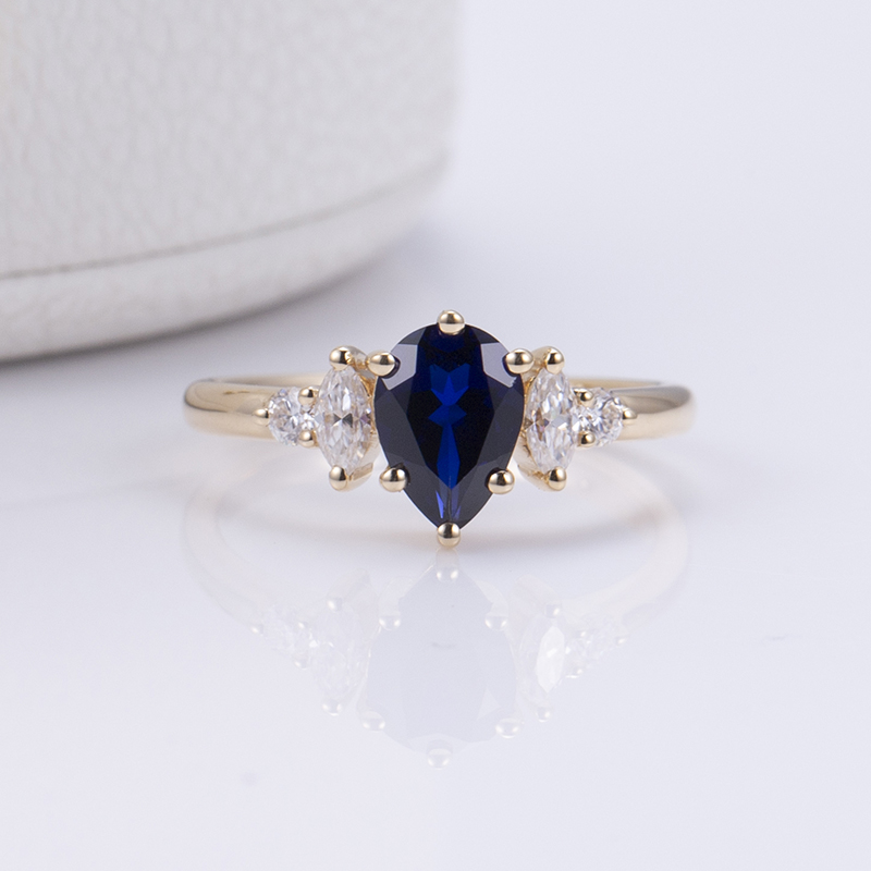 18K Gold Pear Cut Deep Blue Lab Grown Diamond Engagement Ring with Oval Side Stones