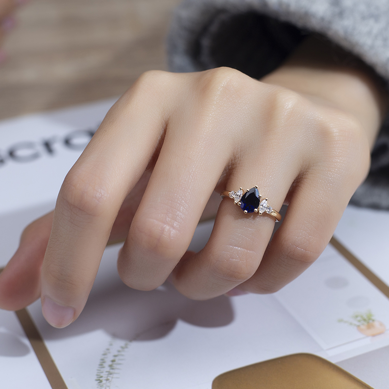 18K Gold Pear Cut Deep Blue Lab Grown Diamond Engagement Ring with Oval Side Stones