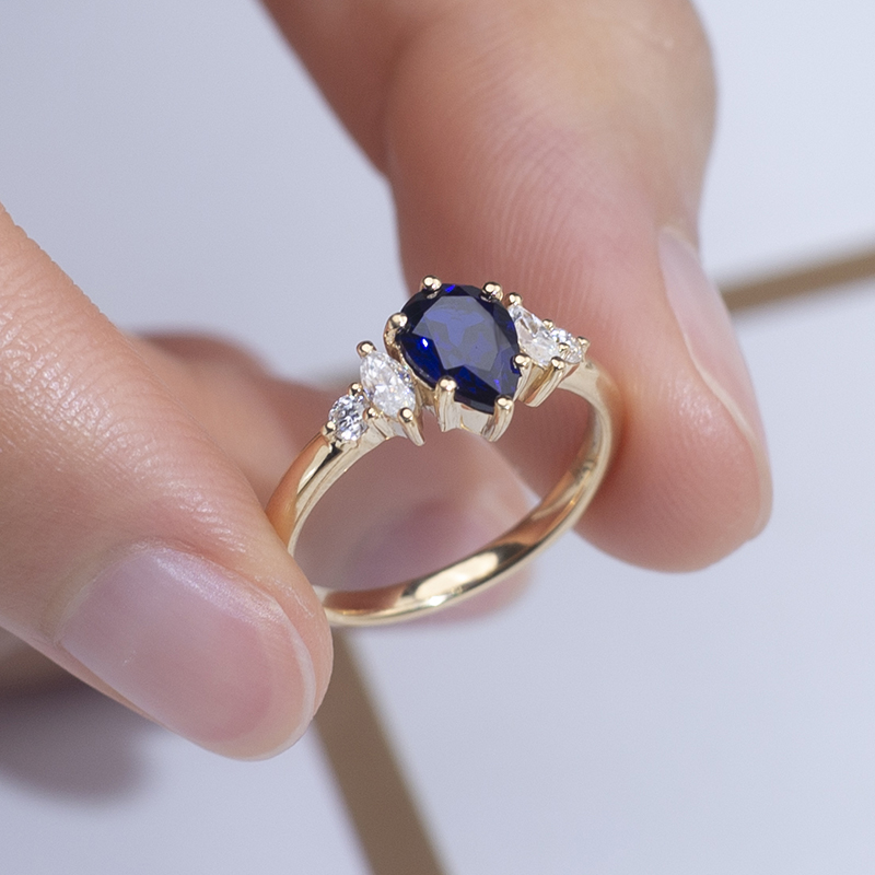 18K Gold Pear Cut Deep Blue Lab Grown Diamond Engagement Ring with Oval Side Stones