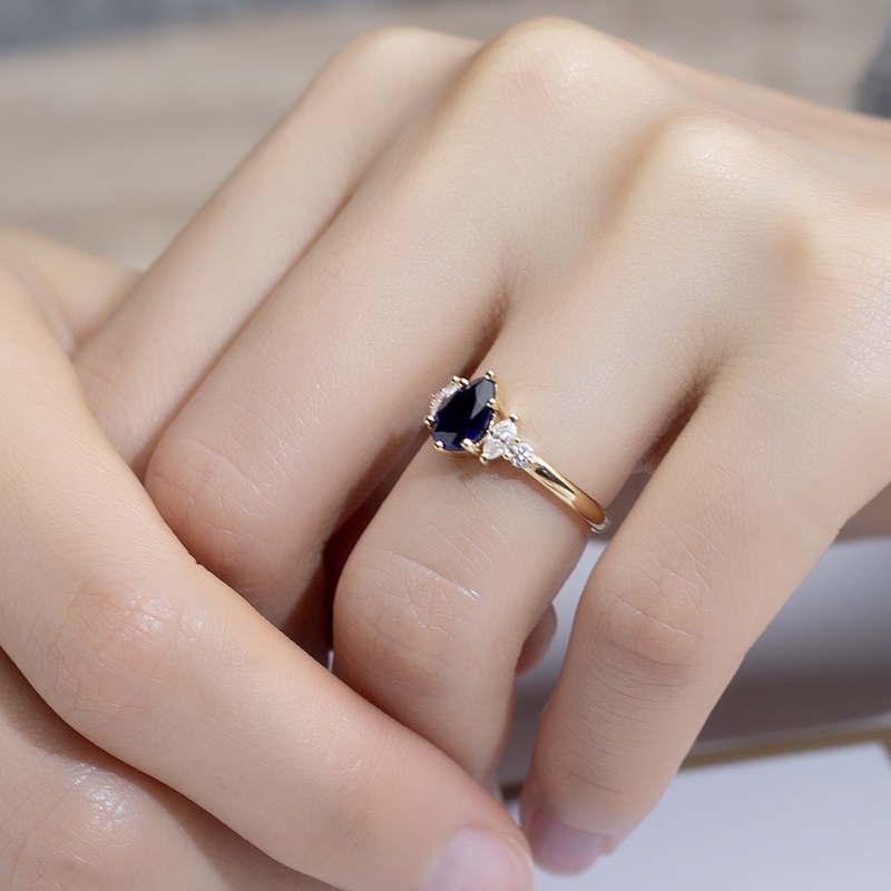 18K Gold Pear Cut Deep Blue Lab Grown Diamond Engagement Ring with Oval Side Stones