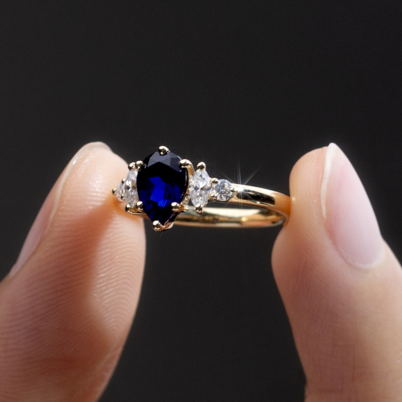 18K Gold Pear Cut Deep Blue Lab Grown Diamond Engagement Ring with Oval Side Stones